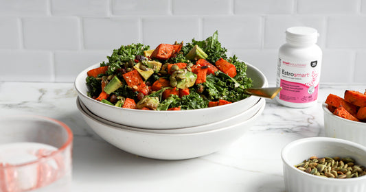 bowl of salad with Estrosmart on the side 