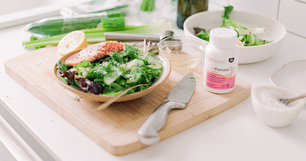 bowl of salmon salad on a cutting board