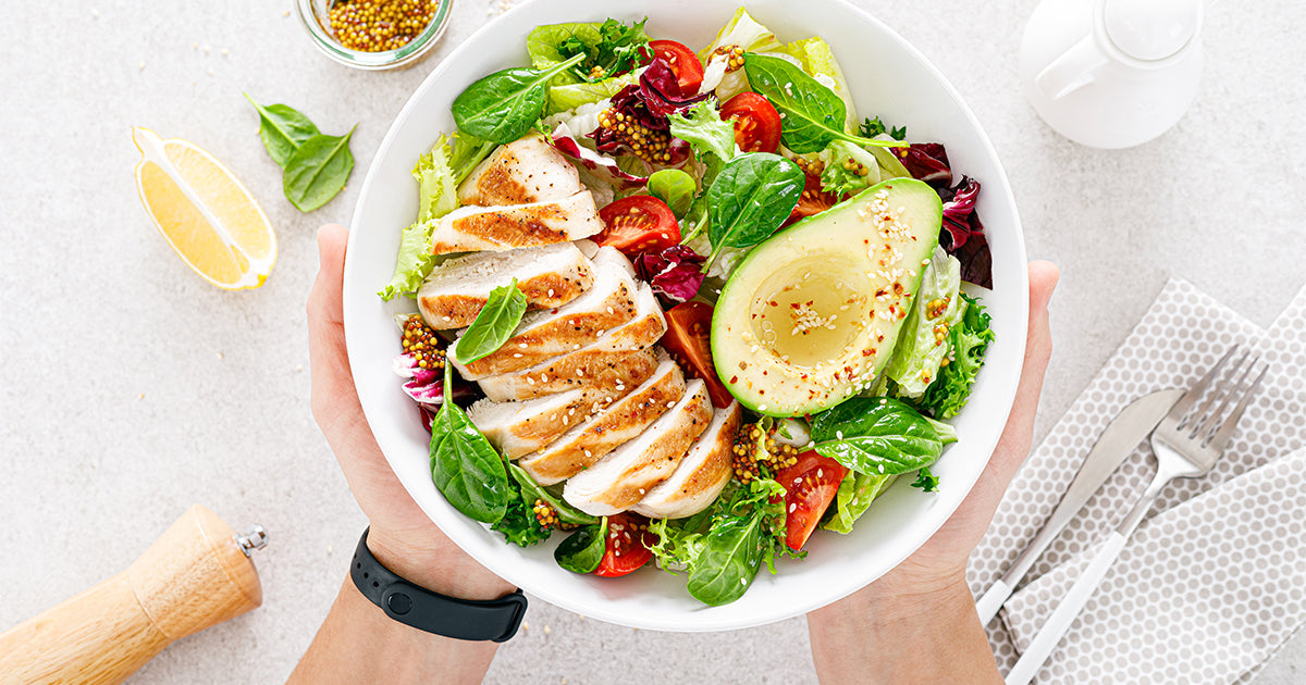 healthy salad with avocado and chicken